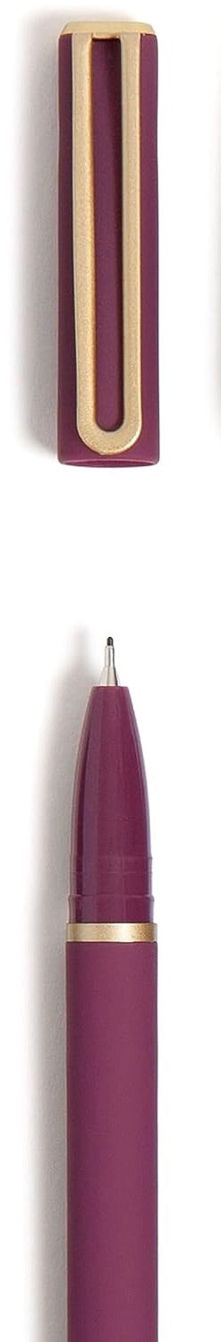 A burgundy pen with a matte finish and gold detailing, shown with cap off and pen tip exposed.