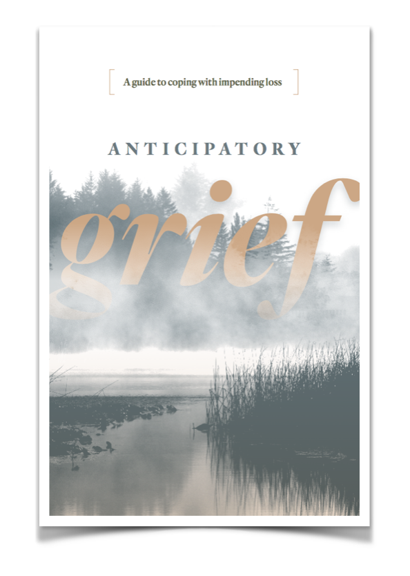 The cover of *Anticipatory Grief: A Guide to Coping with Impending Loss* features a serene, misty lake scene with muted tones, evoking a sense of reflection. The title emphasizes the emotional experience of grieving before a loss occurs. The design is soft and calming, reinforcing the booklet’s purpose—to provide **guidance and support for those navigating the complex emotions of anticipatory grief**.