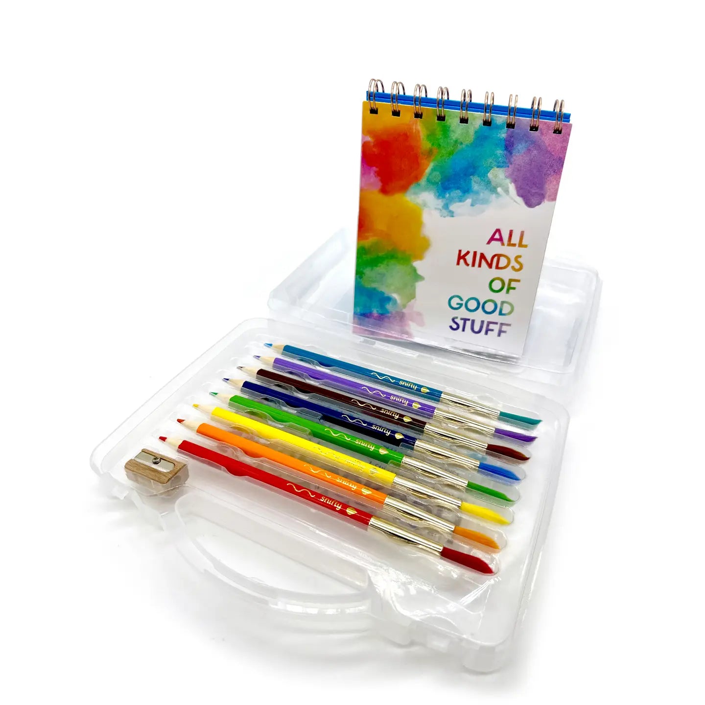 Set of colorful pencils with a small notebook labeled 'All Kinds of Good Stuff' on a white background